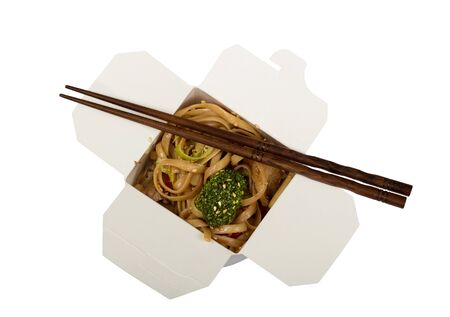 Outdoor lunch box with noodles and vegetables, chopsticks, isolated on white backgroundの写真素材