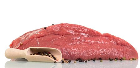 Piece of fresh veal, set peppers in wooden scoop isolated on white backgroundの写真素材