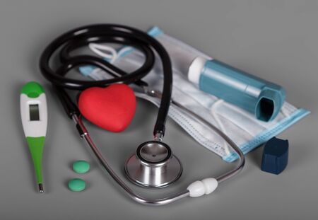 The set of items for diagnosis and treatment on gray backgroundの写真素材