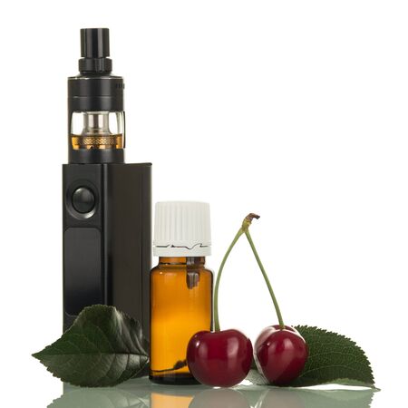 Electronic cigarette and liquid for smoking with cherry flavor, isolated on white backgroundの写真素材