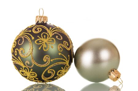 Big green and small silver ball isolated on white backgroundの写真素材