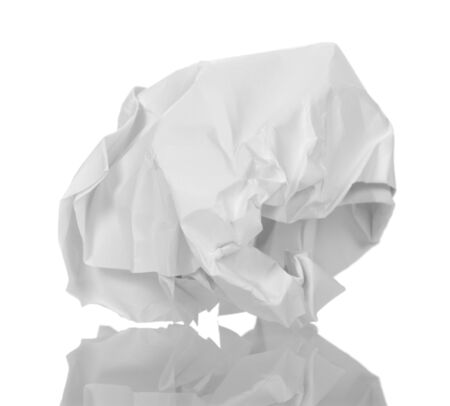 A ball of crumpled white paper isolated on white background.の写真素材