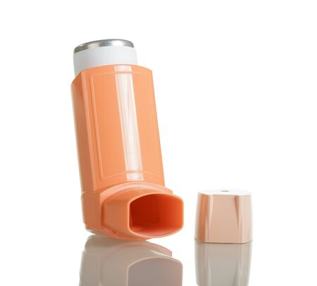 Asthma inhaler isolated on a white background.の写真素材