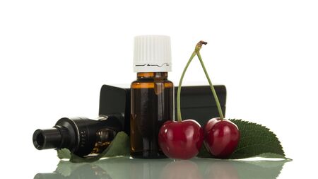 Electronic cigarette and liquid for inhale steam, with a cherry flavor, isolated on white backgroundの写真素材