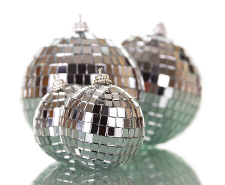 Big and small bright, mirror balls isolated on a white backgroundの写真素材