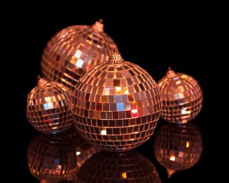 Mirror big and small balls shimmering on a black backgroundの写真素材