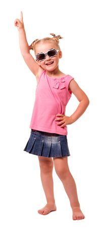 A cute little blond girl with sunglasses isolated on white background.の写真素材