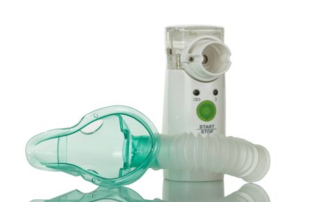 Membrane of the ultrasonic nebulizer with children's mask, isolated on white backgroundの写真素材