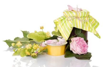 Jar of jam of rose, honey and linden branch isolated on white backgroundの写真素材