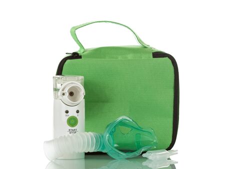 Ultrasonic mesh-nebulizer, children mask, and ampoule with medication isolated on white backgroundの写真素材