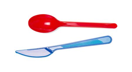Disposable plastic tableware, spoon and knife, isolated on white backgroundの写真素材