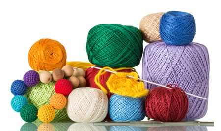 Large selection of yarn in different colors and textures for manual creativity, isolated on white backgroundの写真素材