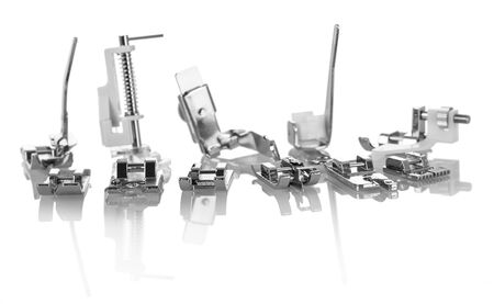 Replacement presser foot for household sewing machine isolated on white backgroundの写真素材
