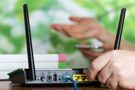 Wireless equipment, modern  router for Internet connection, on tableの写真素材
