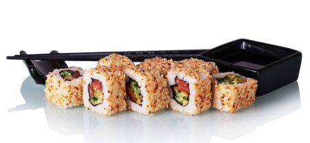 Sushi rolls with salmon and avocado in sesame, wasabi bowl and chopsticks isolated on white backgroundの写真素材