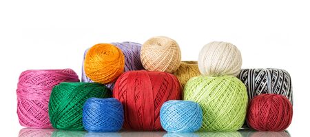 Large selection of cotton yarn in different shades isolated on white backgroundの写真素材