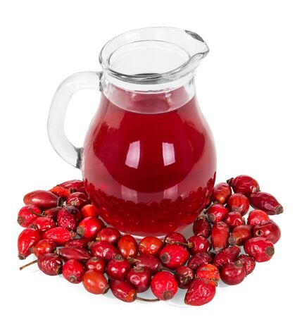 Brier berries and jug of drink isolated on white background.の写真素材