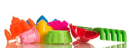 Bright toys for playing in the sandbox isolated on white backgroundの写真素材
