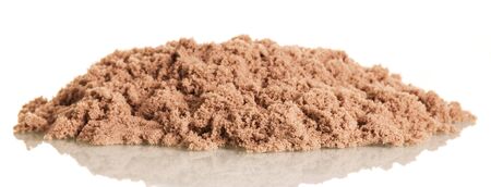 Kinetic sand in a pile closeup isolated on white background.の写真素材