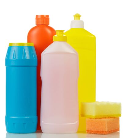 Colored plastic bottles with liquids, scouring powder, sponges isolated on white background.の写真素材