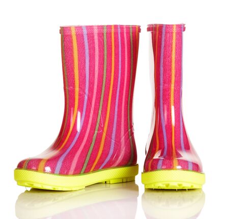 Children rubber boots for the walk in the rain and after isolated on a white background.の写真素材