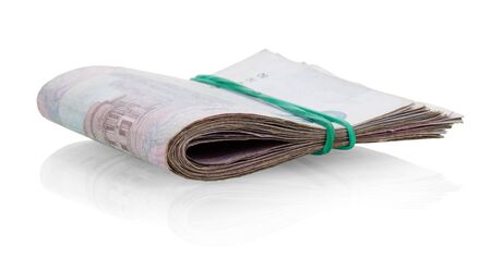 Tutu Ukrainian money fastened by a rubber band isolated on white background.の写真素材