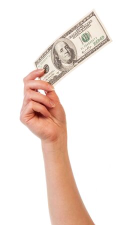 The female hand a hundred dollar banknote isolated on a white background.の写真素材