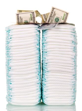 Stacks of diapers and dollars isolated on a white background.の写真素材