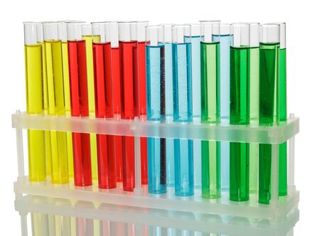 Test tubes with colorful liquids in the container isolated on white background.の写真素材