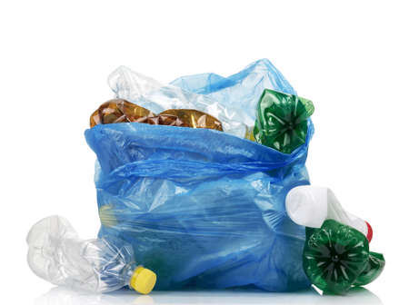Garbage bag full of plastic waste, eggplants and bottles isolated on white backgroundの写真素材