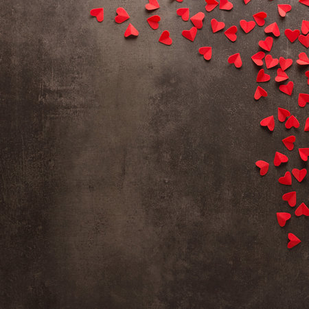 Many bright red hearts on a dark background. Place for an inscription. Valentine's Day. Top viewの写真素材