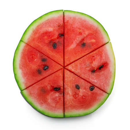 Round slice of juicy fresh watermelon cut into slices isolated on white backgroundの写真素材