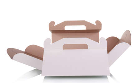 Cardboard box packaging for transporting cake isolated on white backgroundの写真素材