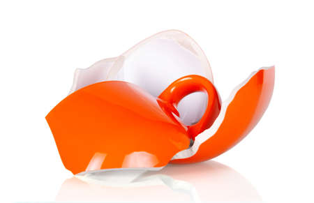 Shards of a broken large cup for soup isolated on a white backgroundの写真素材