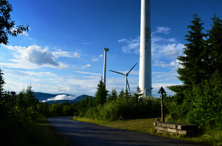 Wind power station in Jeseniky mountains in summer dayの写真素材