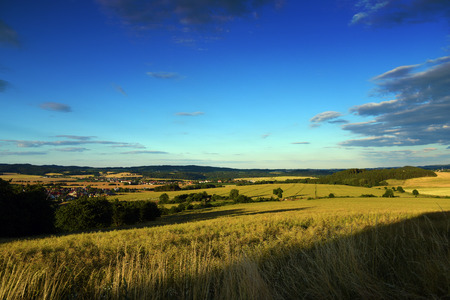 Evening near small town Okrisky in summer sunny day