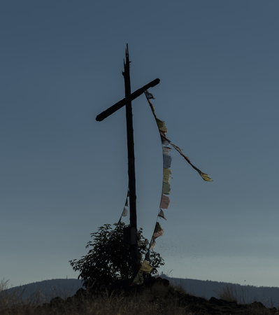 Cross on Velky Spicak hill in Krusne hory mountains