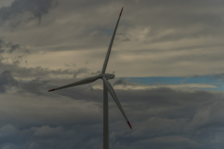 Wind power plant near Komari vizka hill in autumn time