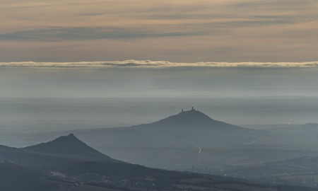 View on Ceske Stredohori mountains from Milesovka hill in winterの写真素材