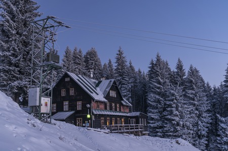 Navrsi cottage before sunrise in winter timeの写真素材