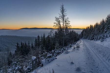 Sunrise in Jeseniky mountains in Christmas time near Kralicky Sneznik hillの写真素材