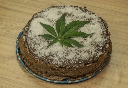 Chocolate marijuana cake with marijuana green butterの写真素材