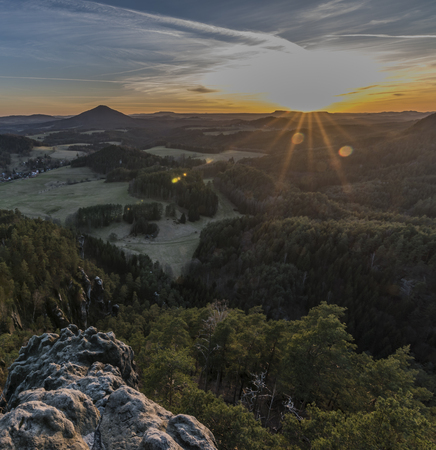 Sunset in national park from hill over Jetrichovice villageの写真素材