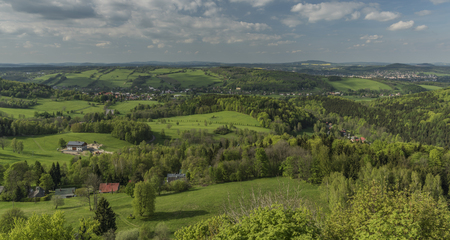 Spring cloudy day with blue sky from Tolstejn castle in Jiretin areaの写真素材
