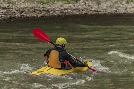 Kayaks on river Dunajec with male on boardの写真素材