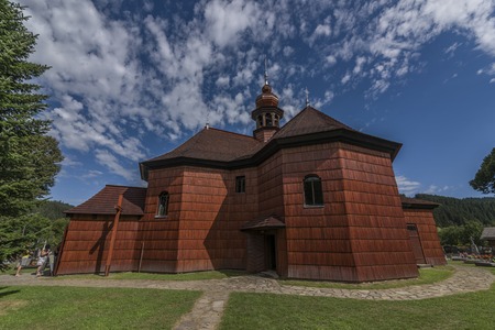 Wooden church in Velke Karlovice village in summer dayの写真素材