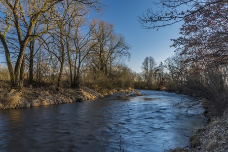 Malse river near Ceske Budejovice city in sunny winter dayの写真素材