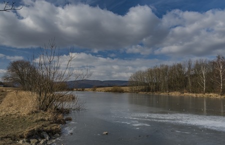 Pond with ice on Strizak hill in Usti nad Labem cityの写真素材