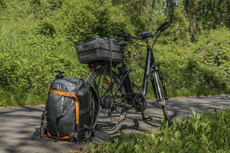 Backpack and bike on path near Litomerice town in spring sunny nice dayの写真素材