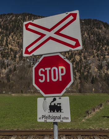 Sign near railway crossing near Ebensee town in spring nice morningの写真素材